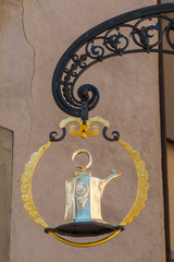 Poster - close up medieval guild sign for a guesthouse and tavern in the historic old city of Chur in Switzerland