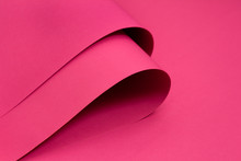 Folded Pink Paper On Pink Background