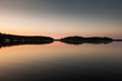 © Stephen W. Morris Photography/Stocksy - Morning calm on lake