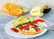  Keto Breakfast With Cream Cheese On Cloud Bread Served With Avocado, Salami And Bell Pepper. Healthy Low-carb, Gluten Free Ketogenic Diet Meal With Oopsie Rolls.