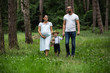 © romul014 - Pregnant young woman with her family in nature