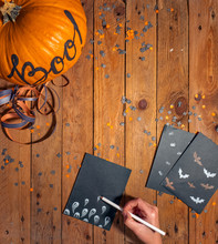 Woman Drawing Halloween Cards