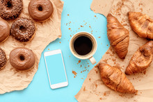 Coffee Croissants And Chocolate Doughnuts With Smart Phone Mock Up