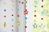 Fototapeta Tulipany - Colorful acrylic beads handmade curtain - suncatcher