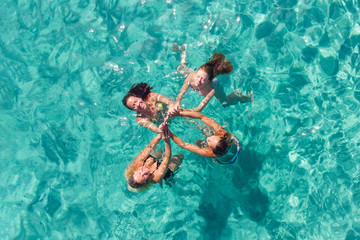 Sticker - Four Woman Friends Having Fun On The Beach