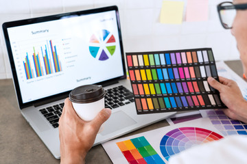 Wall Mural - creative businessman graphic designer do his work at desk consulting and business planning.