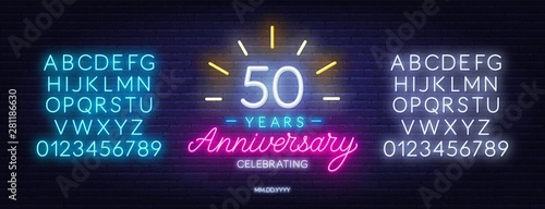 Cuadros en Lienzo Fifty years anniversary celebration neon sign on a dark background