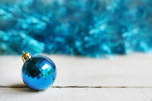 Christmas Background With Blue Toy Ball. Merry Christmas Greeting Card. Winter Holiday Theme. Happy New Year. Space For Text