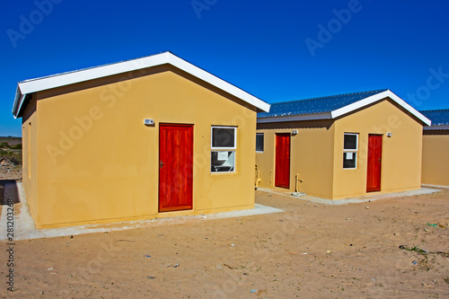 Cuadros en Lienzo Two recently built low-cost RDP homes