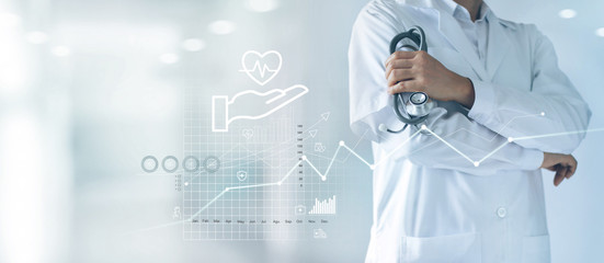 Healthcare business graph and Medical examination, Health Insurance, Doctor with stethoscope in hand and data growth chart ,Medical and medicine business on hospital background.