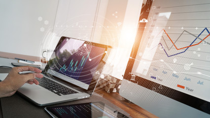 Poster - Business report and sales data with graph economic growth on computer screen network, chart financial, digital marketing, online banking and payment in office background.