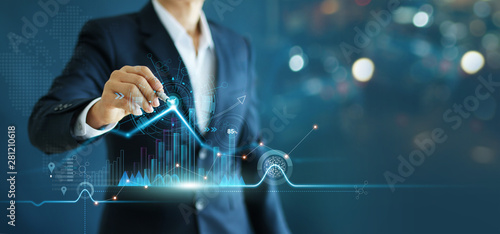 Fotografía Businessman drawing growth graph chart sales and data economic on global structure networking connection