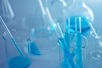 Wall Mural - laboratory research medical and scientific chemical glass flasks for background.
