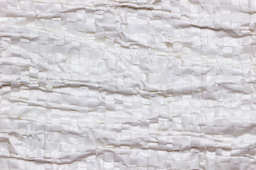 Texture and Wrinkles of white plastic net bag. Concept of recycle product or global warming.