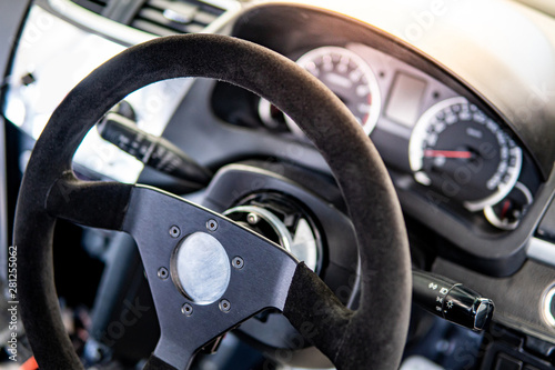 Black Steering Wheel And Dashboard Of Racing Car Auto