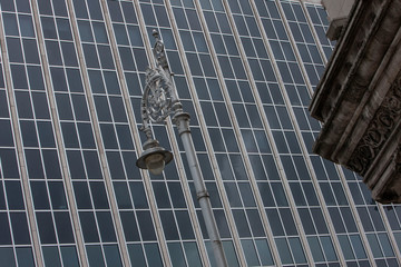 Dublin Ireland. Victorian lantern pole and modern building architecture in the back. Facade. 