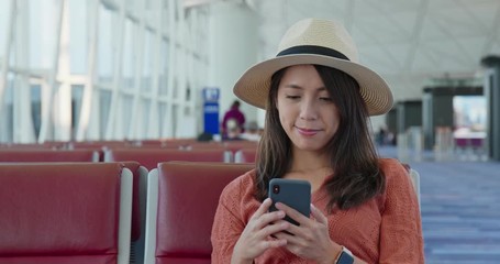 Poster - Woman work on cellphone in the airport