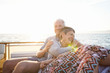 © Westend61 - Affectionate couple on a boat trip at sunset