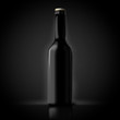 Vector 3d realistic beer bottle isolated on black background. Luxury mock-up for product package branding.