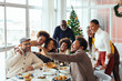 © Bonninstudio/Stocksy - Family Christmas lunch at home.