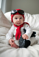 Baby Girl Dressed Up As Aviator For Halloween