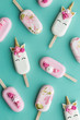 © Ruth Black/Stocksy - Unicorn popsicle background