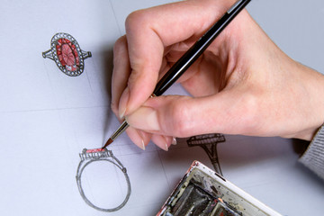 Drawing Jewelry Design. Artist designer drawing sketch jewelry on paper . Design Studio Creativity Ideas .