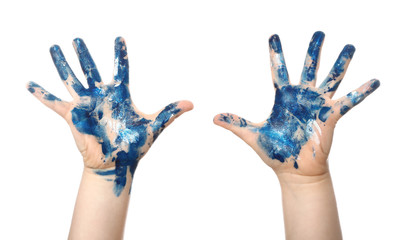 Child's hands in paint on white background