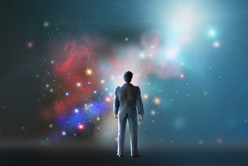 Wall Mural - man stands watching with wonder the universe and amazement galaxy fill the night sky 3d render