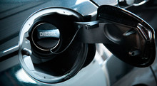 Diesel Car Concept. Open Car Fuel Tank Cap With The Word Diesel.