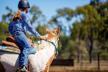 Young Girl On Horseback At Outback Country Rodeo
