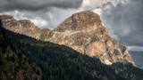 Fototapeta Na ścianę - Cloudy sky over the top of Sassongher, Dolomites, Alta Badia-Italy