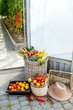 Baskets filled with freshly plucked vegetables and tomatoes on the organic farm