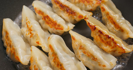 Canvas Print - Fry Meat dumpling in pan