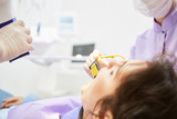 Fototapeta Panele - Zahnarzt beim Röntgen von Zahn einer Patientin