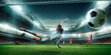 Female Soccer Goalkeeper Catch The Ball On A Professional Soccer Stadium. Girls Playing Soccer