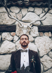 Wall Mural - stylish groom getting prepared for wedding