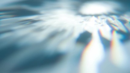 Wall Mural - Overflows of Diamond Edges. Loop. The light passes through the facets of a slowly rotating diamond and creates repetitive sparkling highlights and rainbow colors