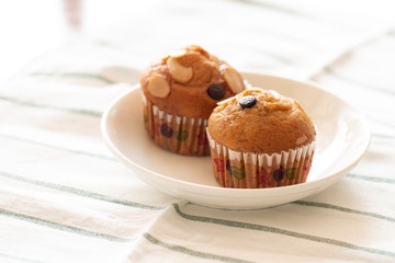 Wall Mural - Homemade Banana cupcake with chocolate and cashew nut