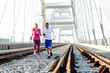 © pucko_ns - Couple jogging at the bridge