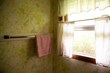 Towel Hanging By Window 