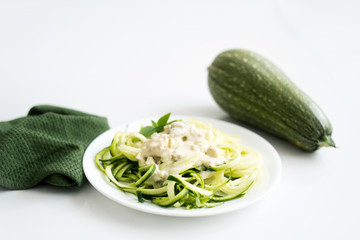 Green Zucchini Noodles with white Alfredo Sauce