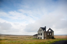 Exterior View Of Ruin House Against Cloudy Sky