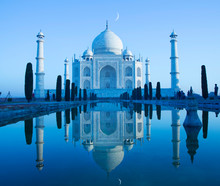 Exterior View Of Taj Mahal Reflecting In Water