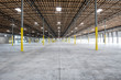 © Mint Images - Interior view of empty warehouse