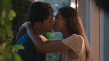 Happy Young Couple First Kiss Beautiful Teenage Girl Kissing Boyfriend Outside Home Enjoying Romantic Evening Date 4k Footage