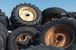 © Mint Images - Pile of discarded farming equipment in rural landfill