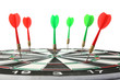 © New Africa - Dart board with color arrows hitting target, closeup