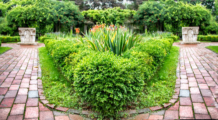 Wall Mural - stone path with bushes leading up to a mansion