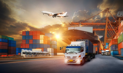 Logistics import export background and transport industry of Container Cargo freight ship and Cargo plane background, Truck transport container on the road to the port